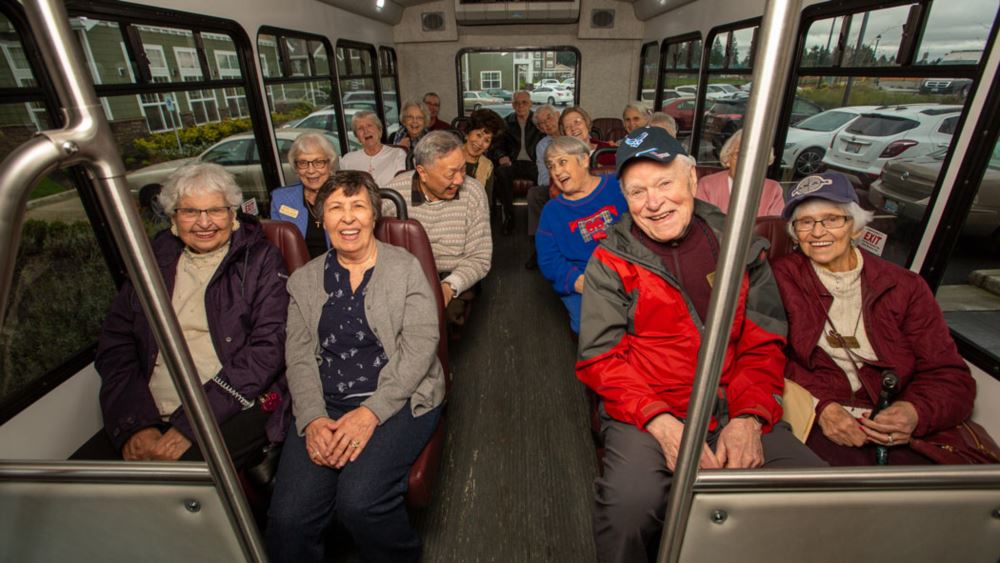 Maple Ridge happy seniors on a bus.
